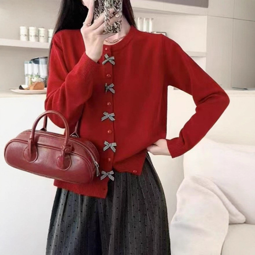 Korean-style soft knit sweater for women new autumn and winter bow button design age-reducing knit coat for women free shipping