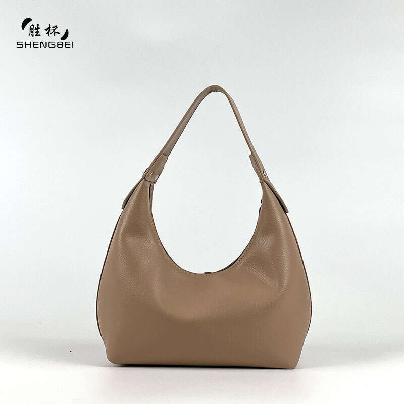 Dongdaemun Hot-Selling Small Handbag Underarm for Women 2023 Light Luxury Design Dumpling Commuter Crescent Bag