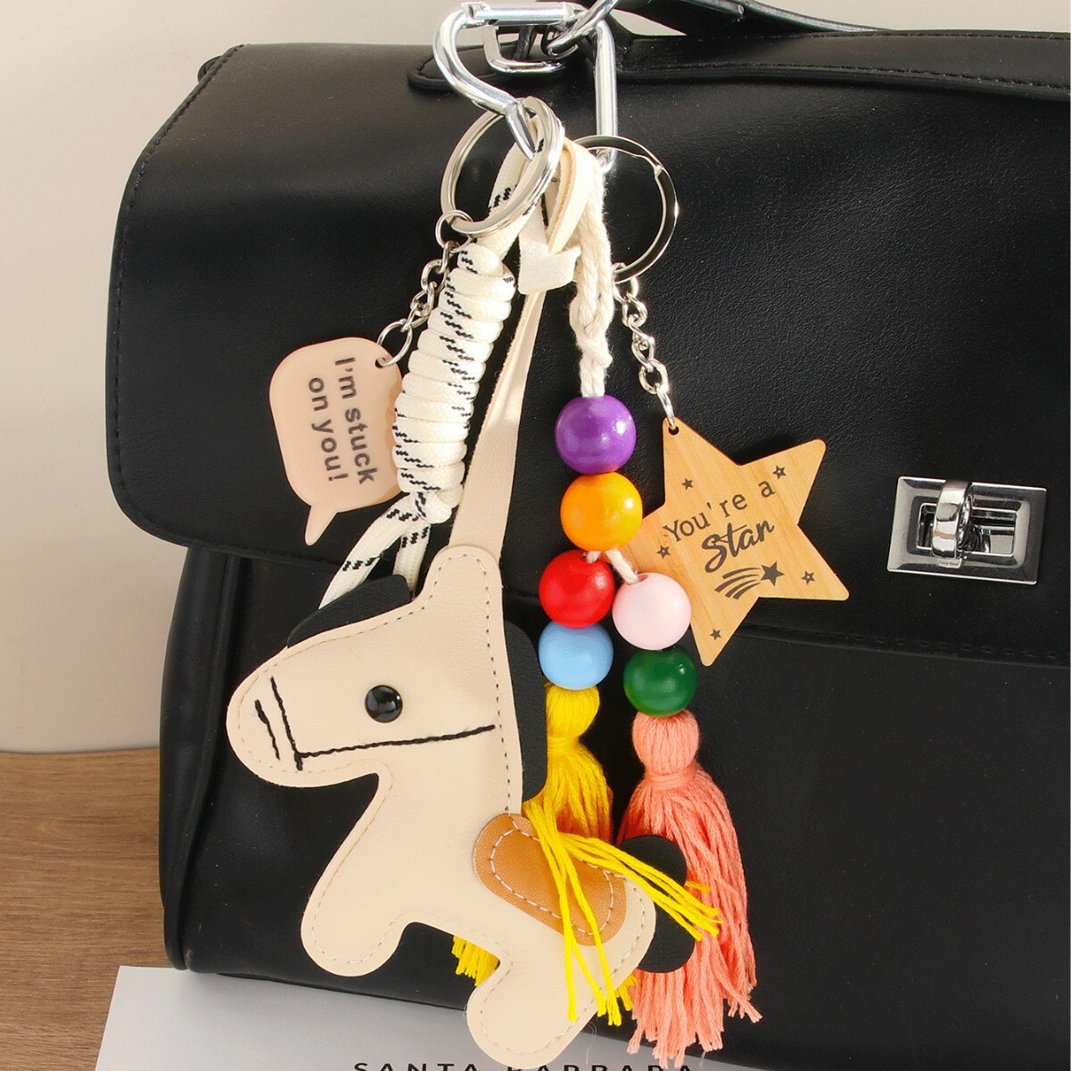 Milk white PU pony star tassel high-end handbag pendant pony keychain car hang