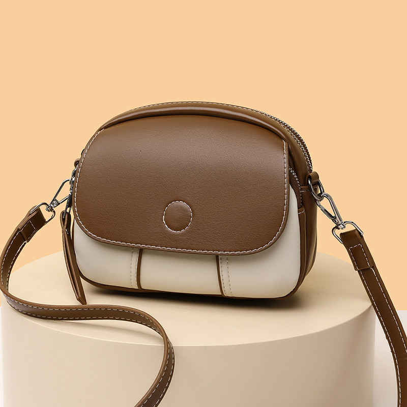 2025 designer's new niche design crossbody bag, mini round shoulder bag, fashionable women's bag