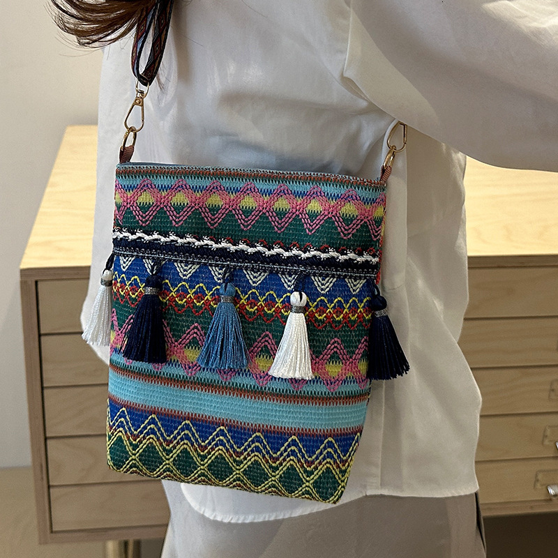 Large fashion capacity ethnic style bag tassel single shoulder bucket bag designer bag retro commuting crossbody bag women s handbag