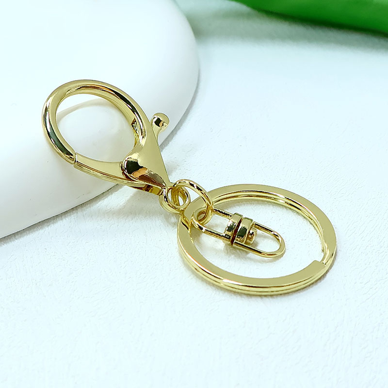 Zinc alloy lobster buckle bag hanging buckle keychain accessories DIY creative cartoon doll gift keychain gold color