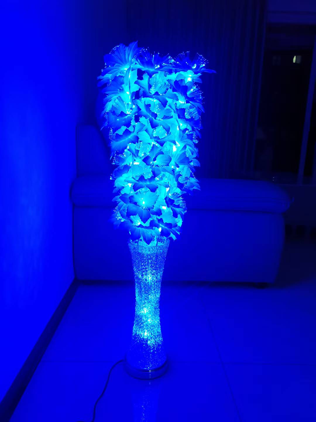 Elegant Crystalline Vessel Holding a Glimmering Optical Fibre Butterfly Bloom
