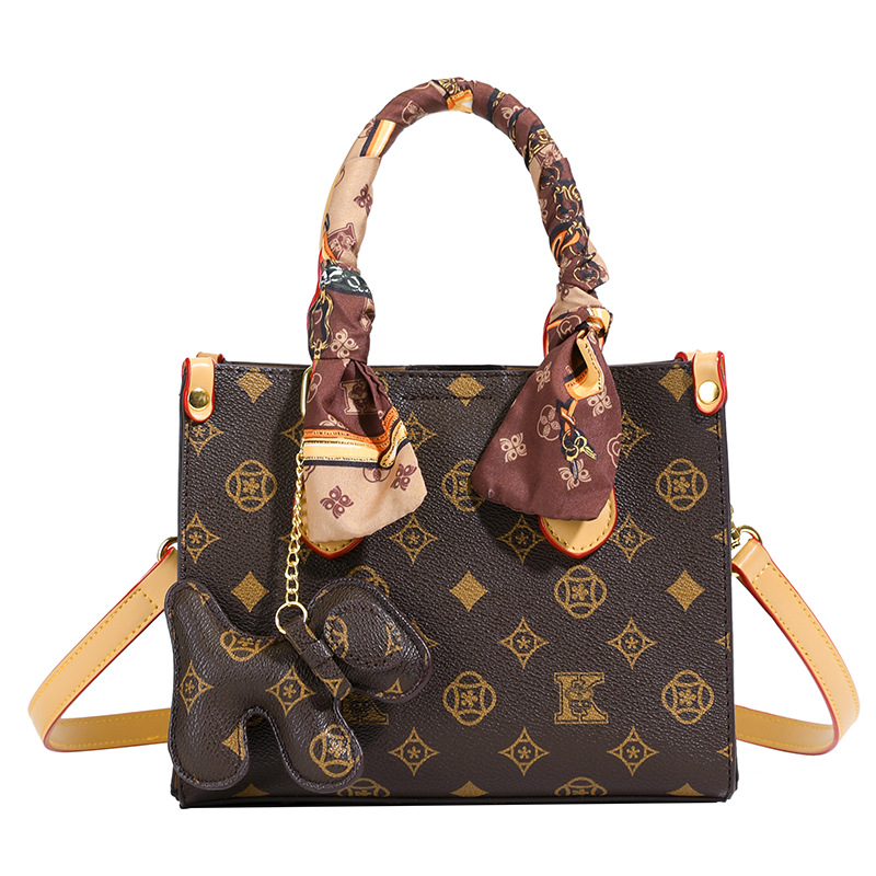 High-end print contrasting letter tote small bag women's 2025 new old flower light luxury Korean temperament shoulder bag