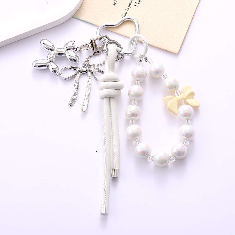 New Ins Acrylic Bird's Nest Beaded Phone Pendant Fashionable High-end PU Leather Rope Bowknot Hanging Decoration