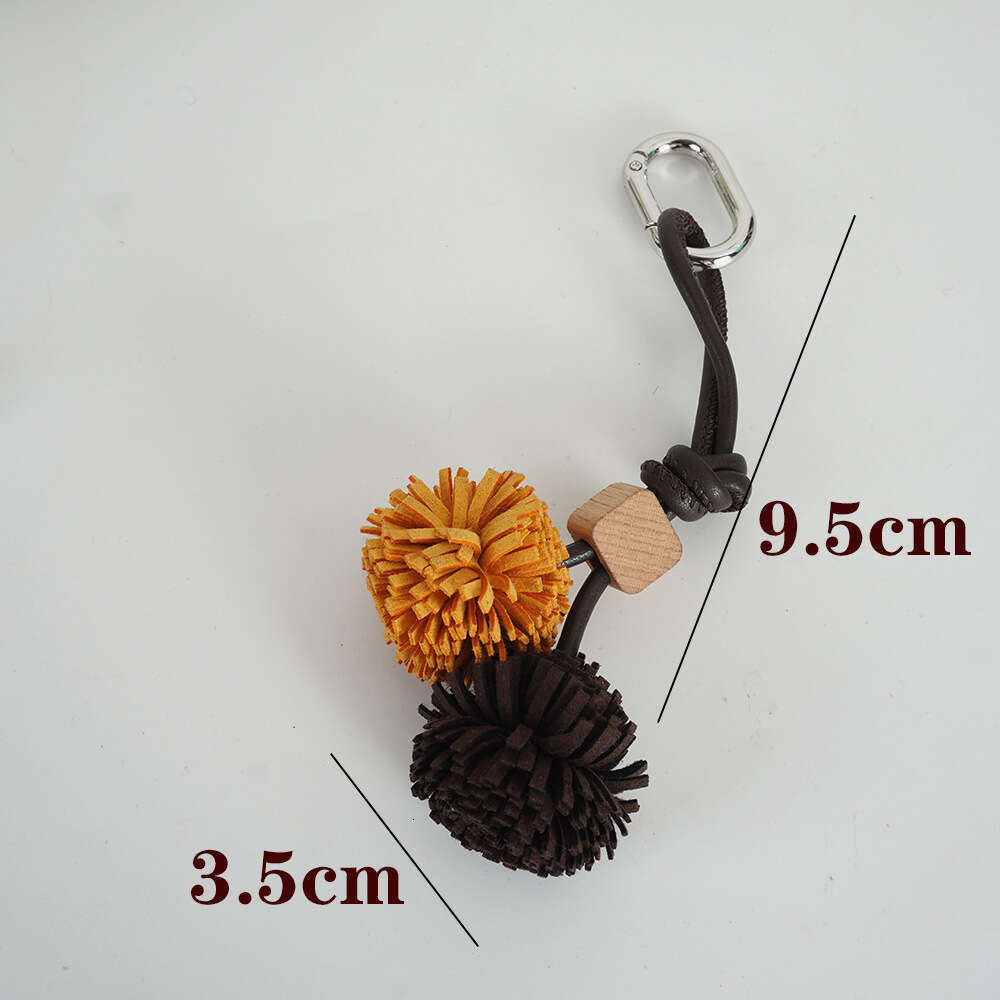 Miu Series Shoe Accessories High-End Mini Leather Handmade Woven Tassel Ball Keychain Bag Pendant