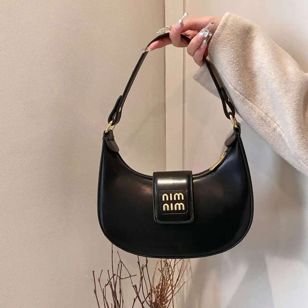 Designer 2025 Shoulder High Quality Women's handbag Purse Leather Metal badge Hobo Crossbody Black Classic Underarm Bag Shopping bag