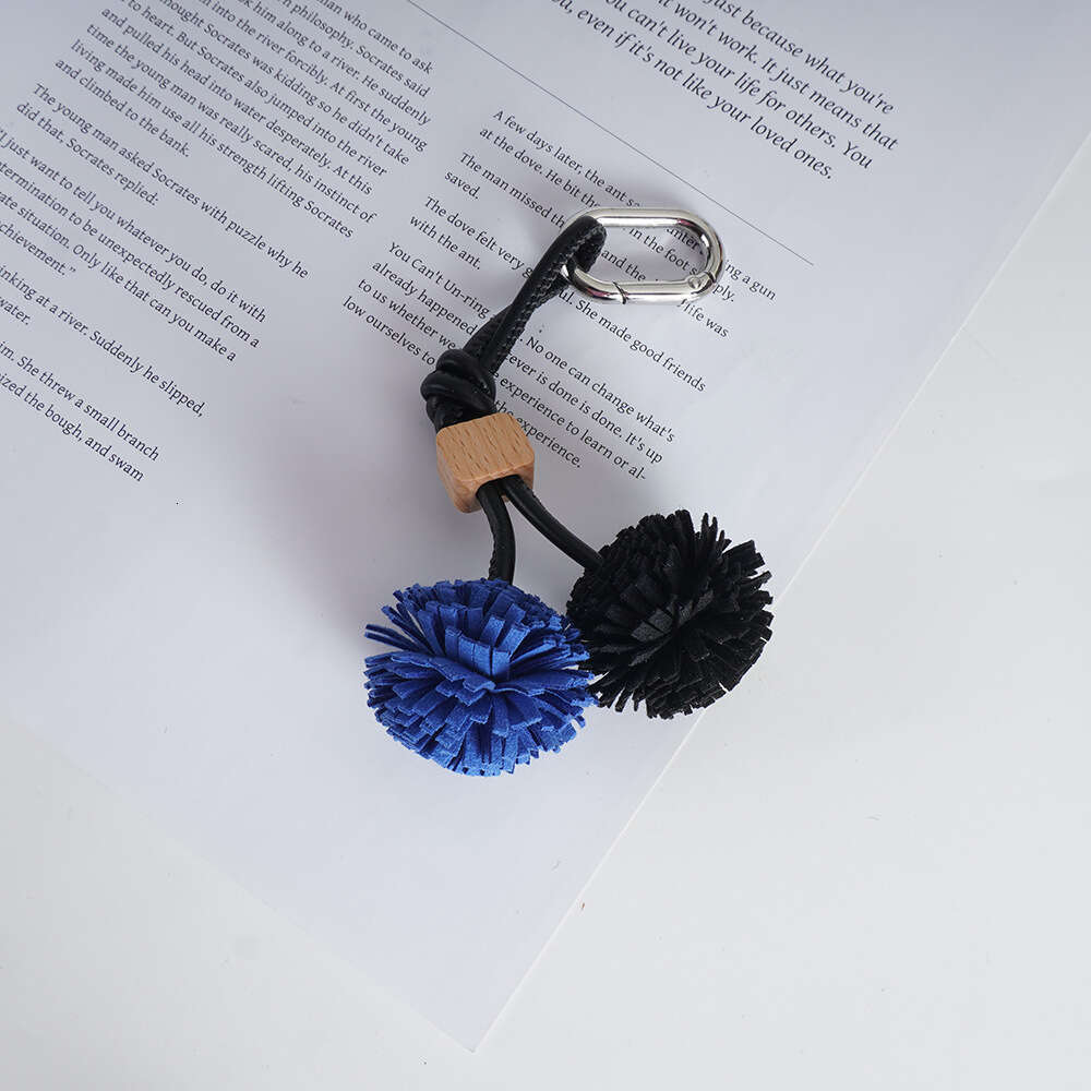 Miu Series Shoe Accessories High-End Mini Leather Handmade Woven Tassel Ball Keychain Bag Pendant