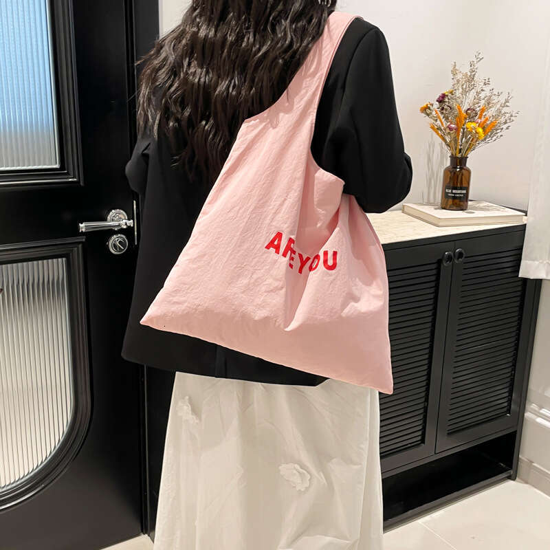 New Niche Alphabet Print Shoulder Large Capacity Designer Versatile Canvas Bag for Women Trendy Shopping Tote
