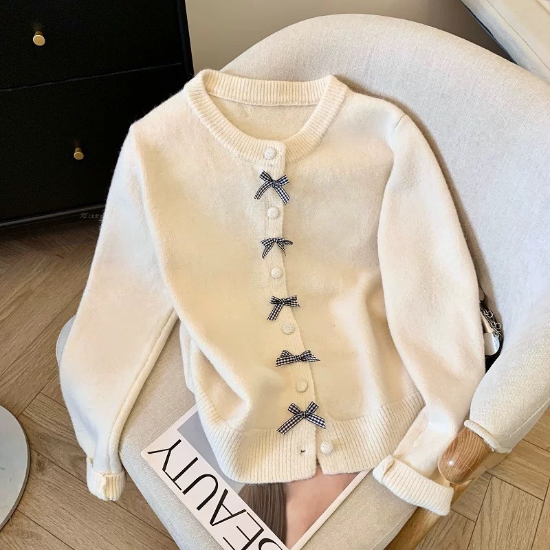 Korean-style soft knit sweater for women new autumn and winter bow button design age-reducing knit coat for women free shipping