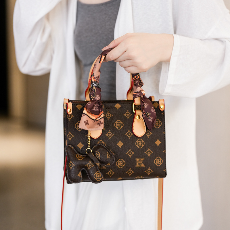 High-end print contrasting letter tote small bag women's 2025 new old flower light luxury Korean temperament shoulder bag