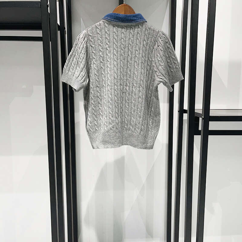 Designer Clothing 2025 2025 New Women's Denim Turn-Down Collar Splicing Twist Sweater Gold Single Breasted Short Sleeve Ladies Gray Knitted Cardi