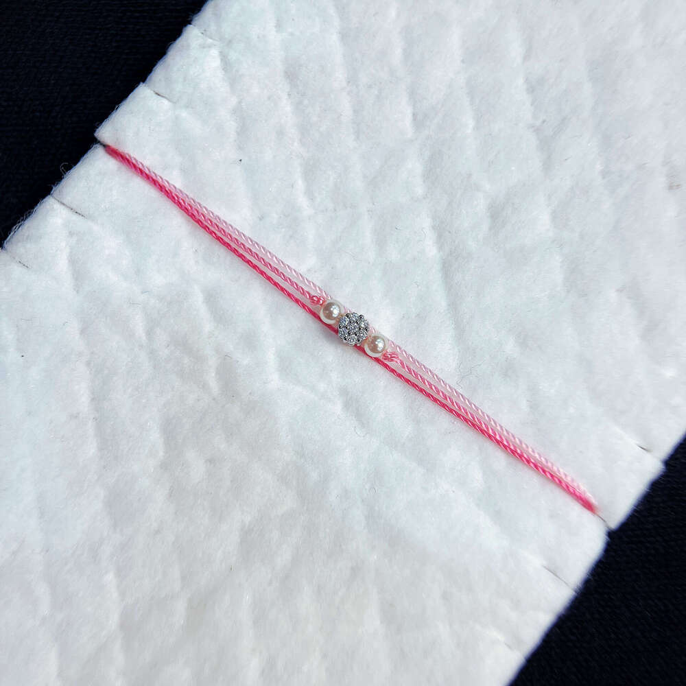 French Paris Fashion New Pearl Small Flower Inlaid Dia Three-Layer Woven Women's Bracelet Zodiac Year Lucky Trend