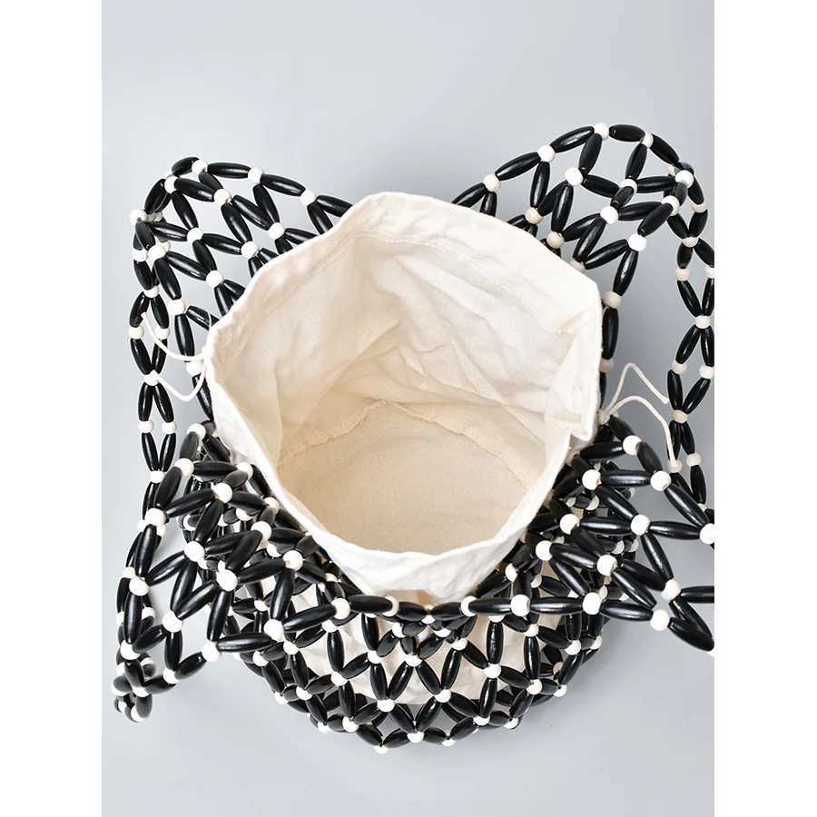 Women Woven hand bag summer design hollow-out wooden bead tote bucket shoulder bag female Reticulate netted canvas beach handbag Y250729