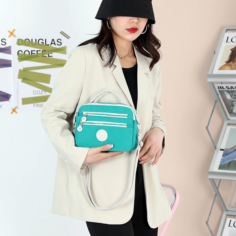 2025 New Women's Fashion Trend Shoulder Simple Color-Block Crossbody Bag Nylon Phone Coin Purse ddmymoon