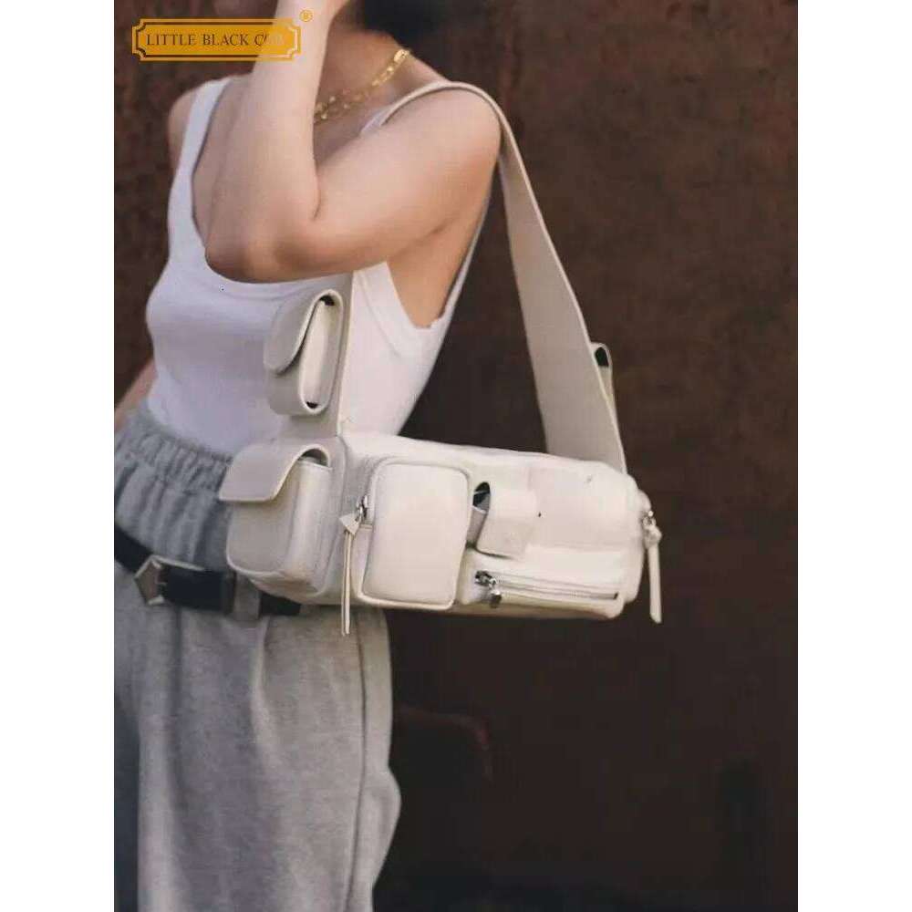 Luxury Designer Niche Ladies Multi-Pocket Flip Leather Shoulder Wide Straps Motorcycle Underarm One Shoulder Causality Tote Tote Bag