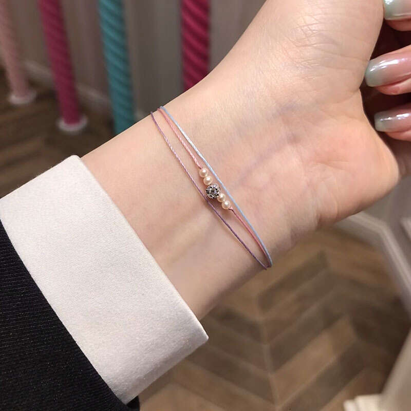 French Paris Fashion New Pearl Small Flower Inlaid Dia Three-Layer Woven Women's Bracelet Zodiac Year Lucky Trend