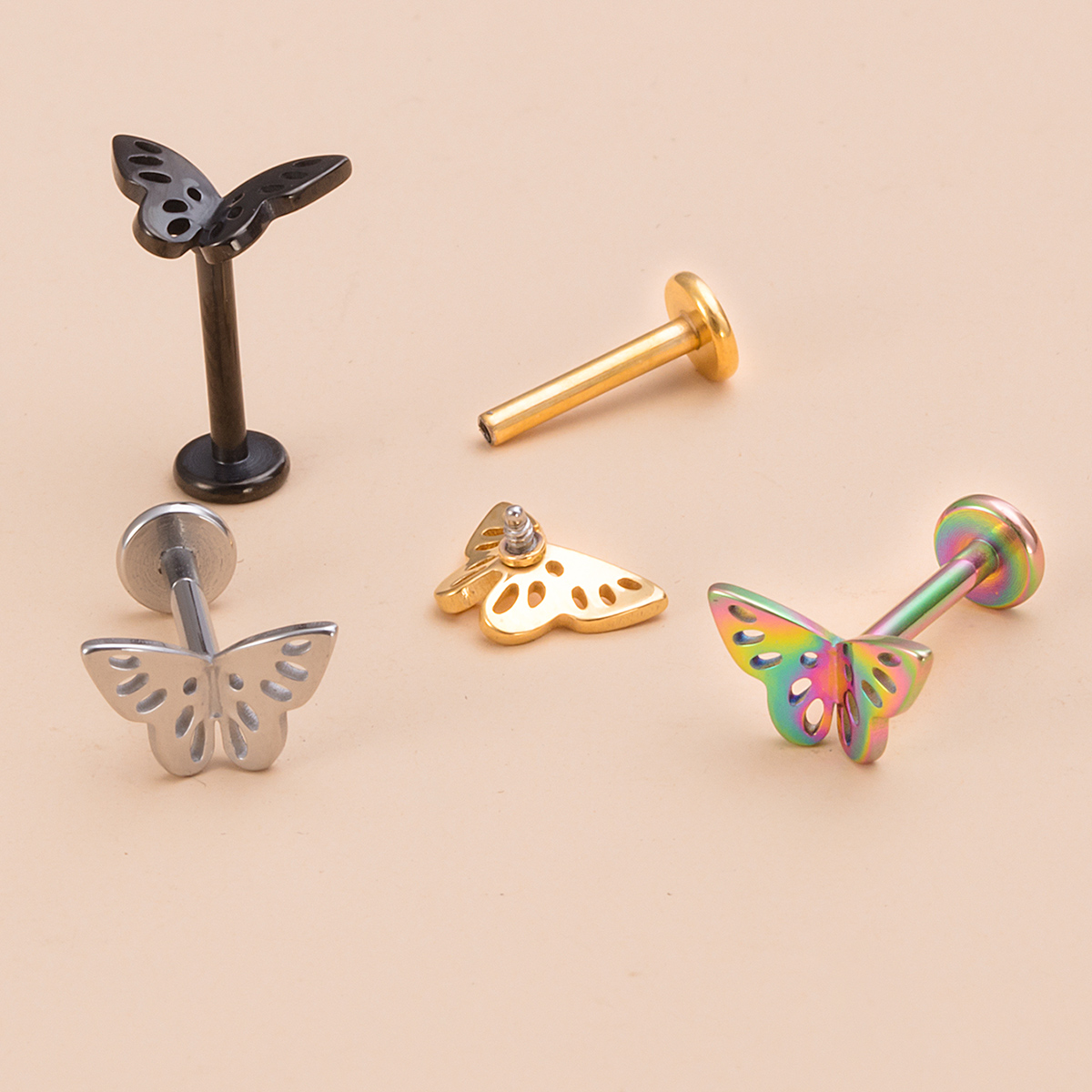 Stainless steel hollow three-dimensional butterfly lip studs, ear bone studs, earrings, body piercing accessories wholesale