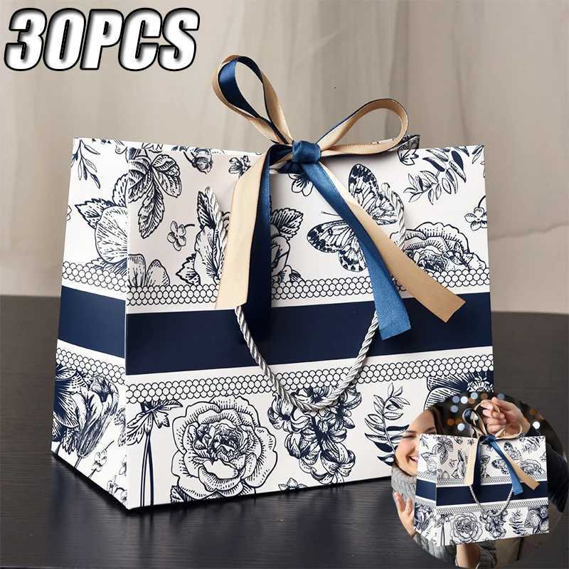 New Gift Bags Floral Paper Bags Cross Border Packaging Bags With Ribbon Holiday Gift Giving Gift Bags Clothing Tote Bags Clothin G250729