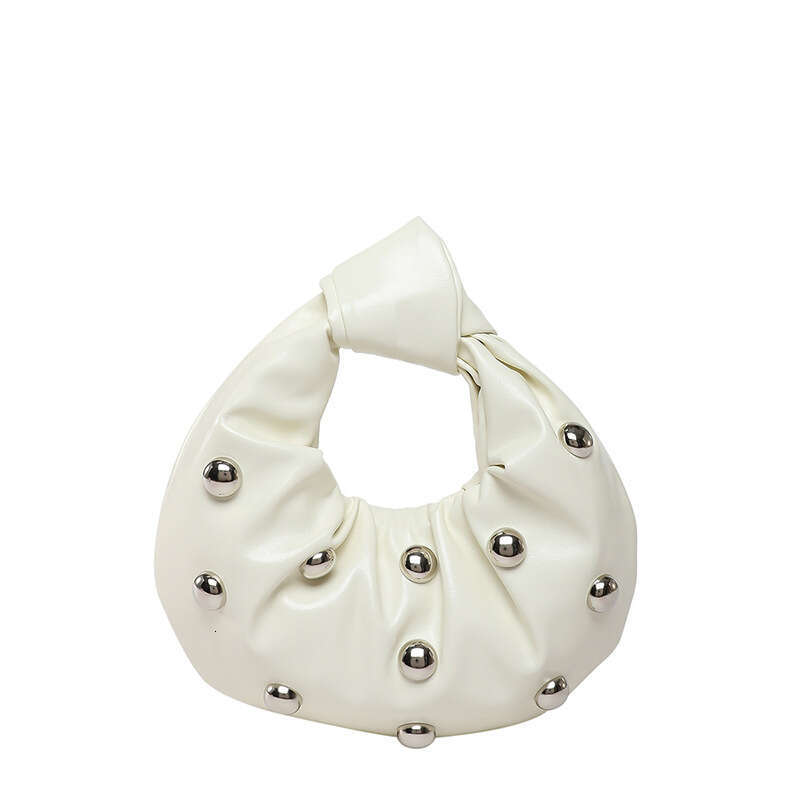 Handheld Dumpling for Women 2025 Summer New Hot Girl Niche Design Rivet Single Shoulder Underarm Bag