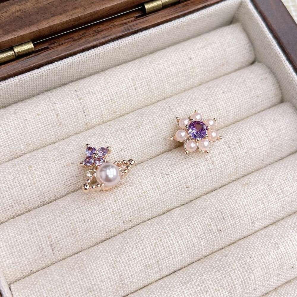 2025 New Western Empress Exquisite Versatile Saturn Pearl Flower Stud Earrings Light Niche Asymmetric Jewelry 0e7