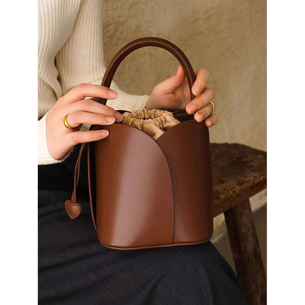 designer bag Drawstring pocket petals new vegetable basket bucket niche design retro handbag women's shoulder crossbody bag