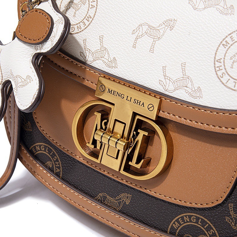 2025 Spring Summer New Fashion Versatile Niche Design Handheld Saddle Commuting Personality Simple Single Shoulder Crossbody Bag ddmymoon
