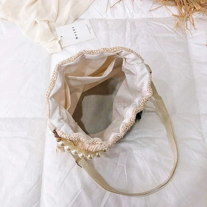 New Straw Plaited Article Women Lace Bucket Bag Casual Holiday Beach Bag Elegant Lace Straw Bag Shoulder Crossbody Bag M250730