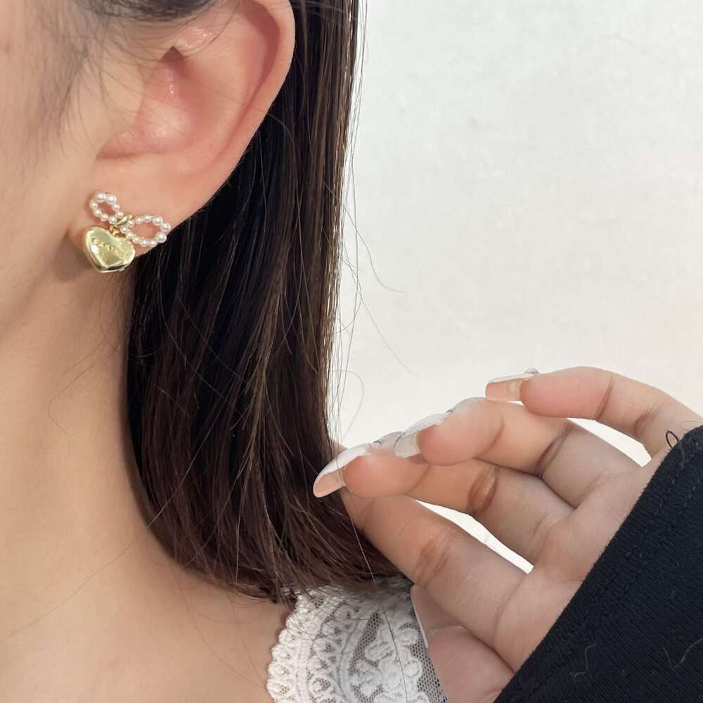 Korean Style New Elegant Pearl Bowknot Metal Feel Exquisite Heart Earrings Light Fashion Versatile Ear Jewelry dd5