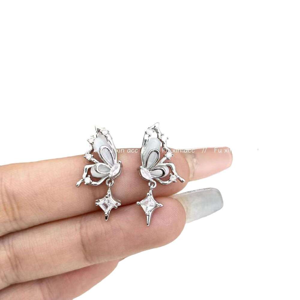 Spring Super Fairy Fantasy Butterfly Imitation Cat's Eye Stone Small and Exquisite Star Zircon Earrings Fashion Versatile Affordable Ear Jewelry 