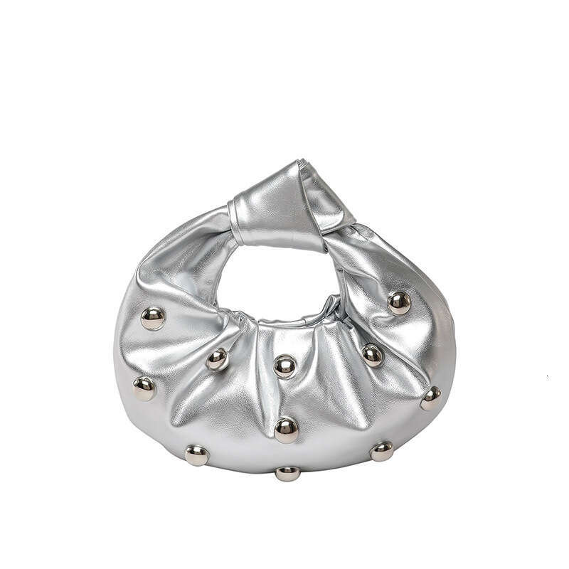 Handheld Dumpling for Women 2025 Summer New Hot Girl Niche Design Rivet Single Shoulder Underarm Bag