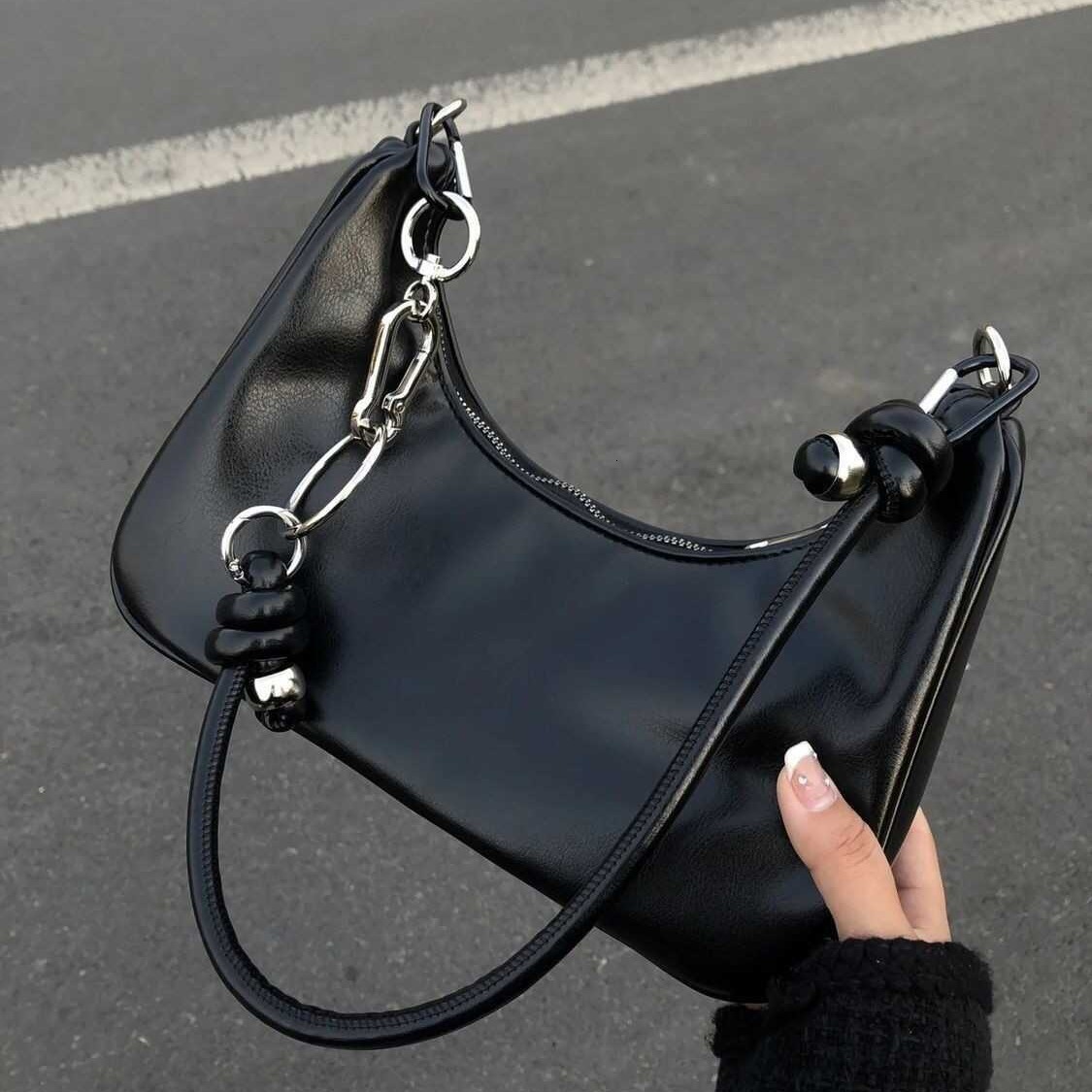 Summer New Women's Shoulder Bag Fashion Handbag Niche Women's Armpit Bag Summer New Commuting Bag Rock Texture Dumpling Bag Designer Bag