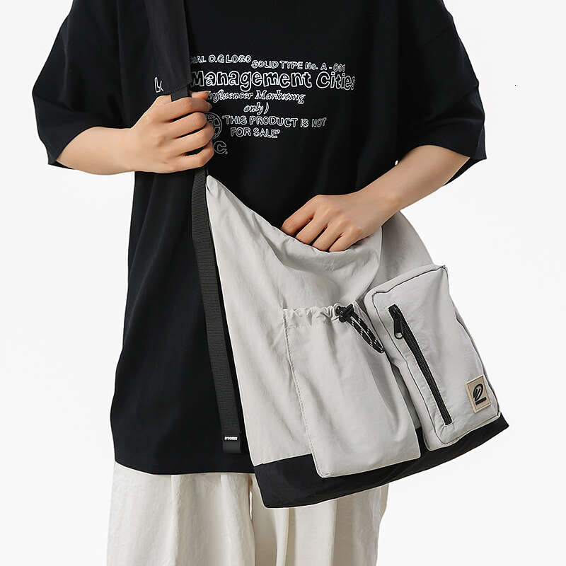 Spliced Nylon Large Capacity for Women, High-End Design Sense, Niche Single Shoulder Bag, Couple's Commuting Crossbody Bag