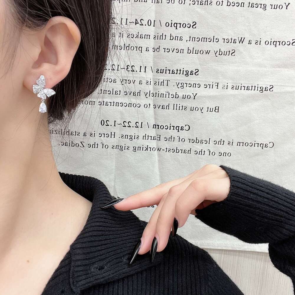 Full Inlaid Shiny Zircon Butterfly Ear Clip Water Drop Pendant White Earrings Niche High-end Sense Brightening Fashion Personality f52