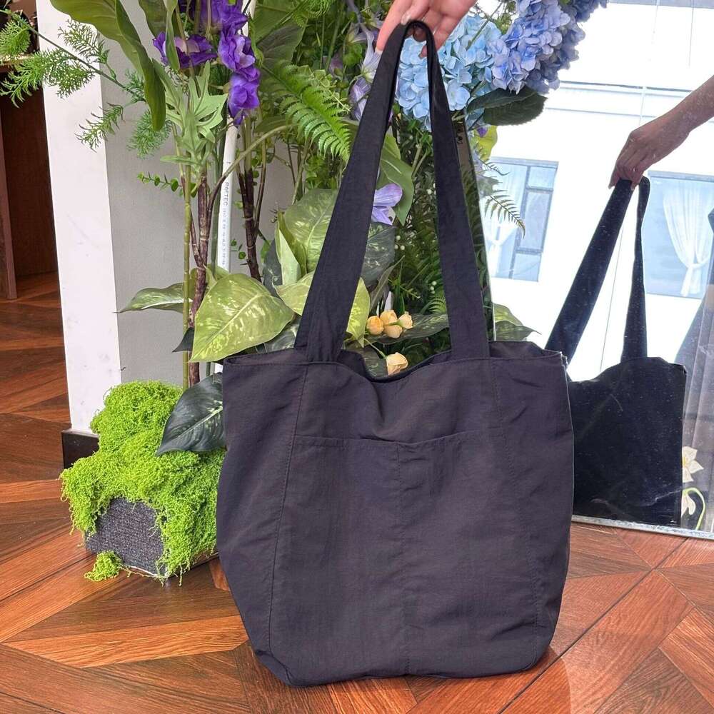2025 New Canvas Casual Shoulder Versatile Women's Design Sense Large Capacity Commuter Tote Bag