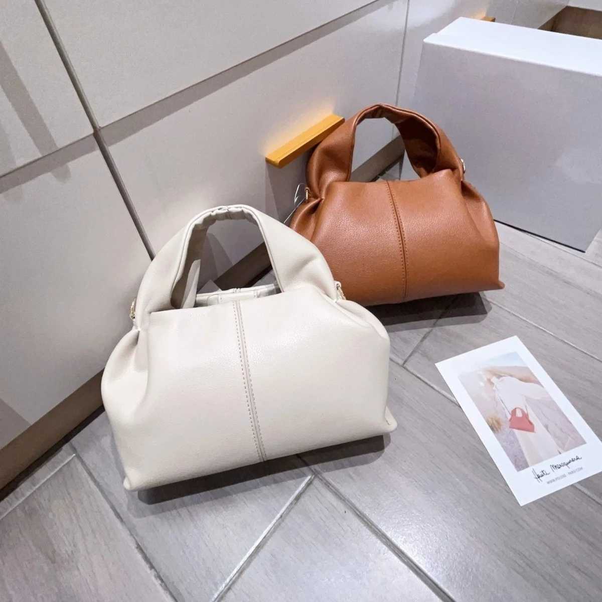 2025 New high-end retro womens must-have fashionable dumpling bag underarm hand-held crossbody bag Y250730