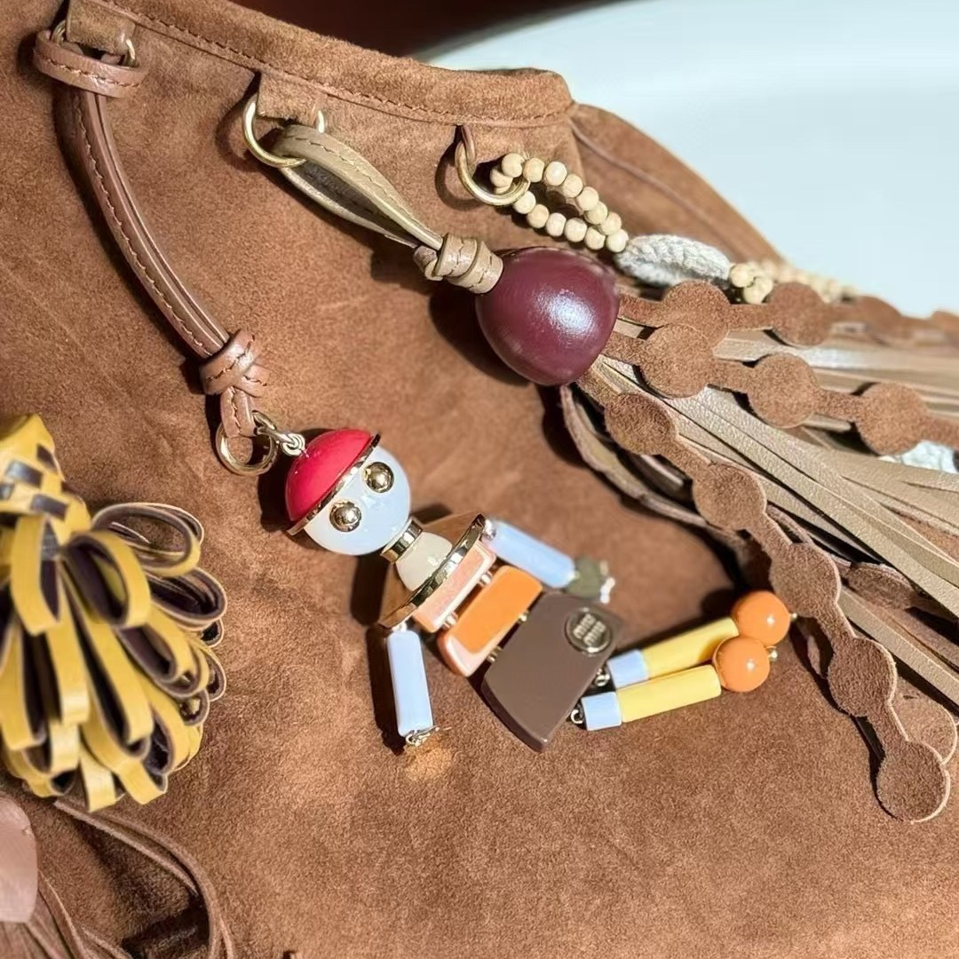 New womens bag suede suede crossbody bag genuine leather handbag for women doll pendant handbag tassel shoulder bag