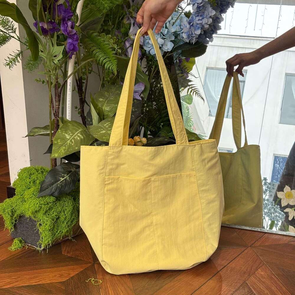 2025 New Canvas Casual Shoulder Versatile Women's Design Sense Large Capacity Commuter Tote Bag