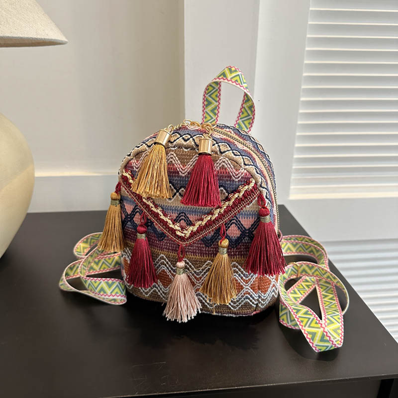 New lightweight women's backpack Chinese ethnic style tassel crossbody bag outdoor travel fashion multifunctional small backpack designer bag