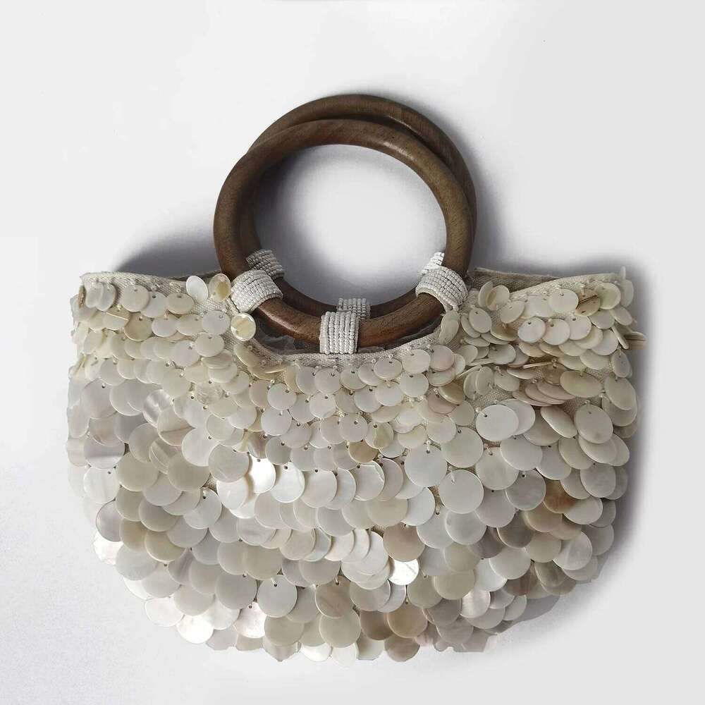 New high-end pure handmade natural shell fairy handbag women's niche subsourcing personalized trendy bag double-sided