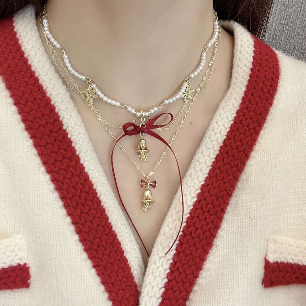 Streamer Bow Bell Pearl Necklace Autumn and Winter Unique Snowflake Tassel Collarbone High-End Neck Chain 78f