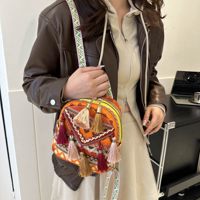 New lightweight women's backpack Chinese ethnic style tassel crossbody bag outdoor travel fashion multifunctional small backpack designer bag