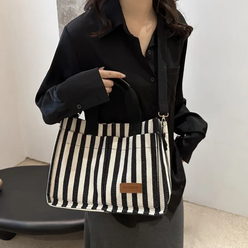 Ladies handbags largecapacity singleshoulder bags striped canvas commuting and travel shopping 250725