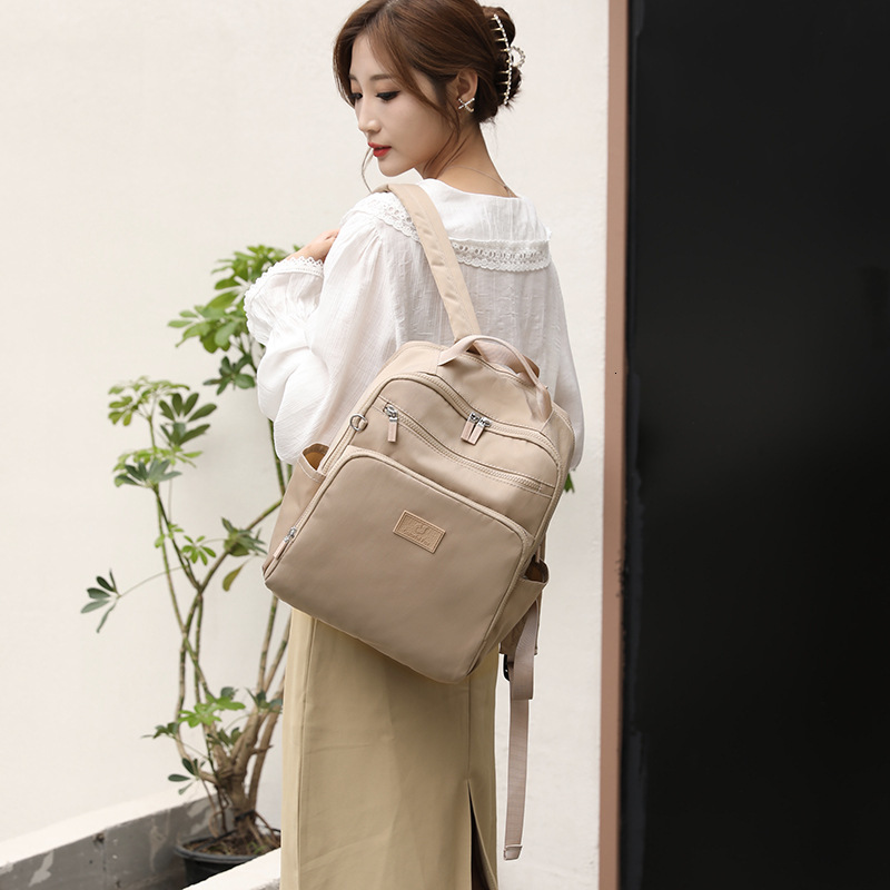 Women Outdoor Large Capacity Travel Backpack Korean Version Trendy Water-Resistant Handbag Simple Nylon School Bag ddmymoon