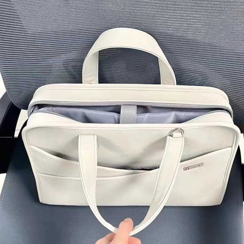 The laptop bag is suitable for Apple 14-inch Lenovo Xiaoxin 15.6 and customer documents. y250730
