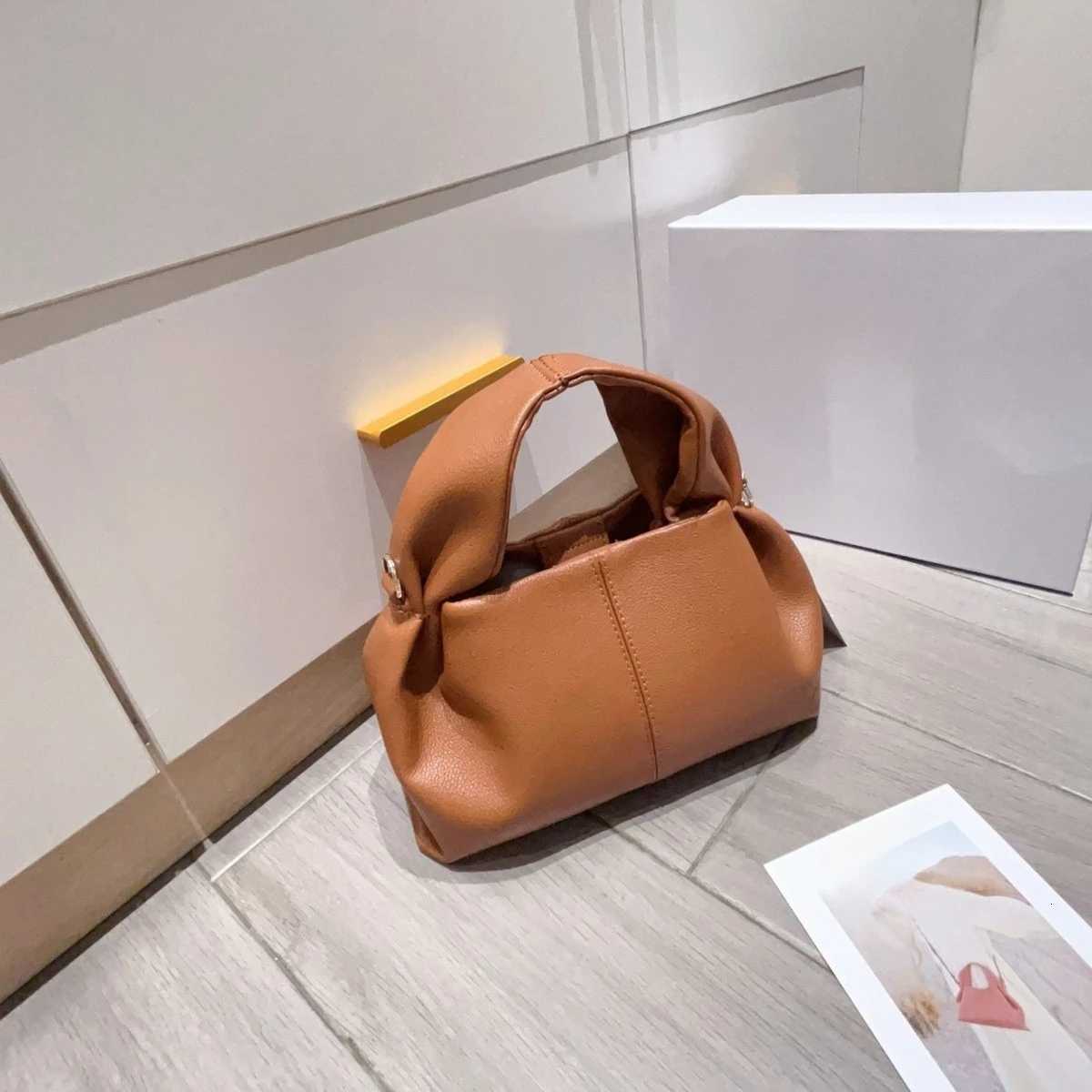 2025 New high-end retro womens must-have fashionable dumpling bag underarm hand-held crossbody bag Y250730