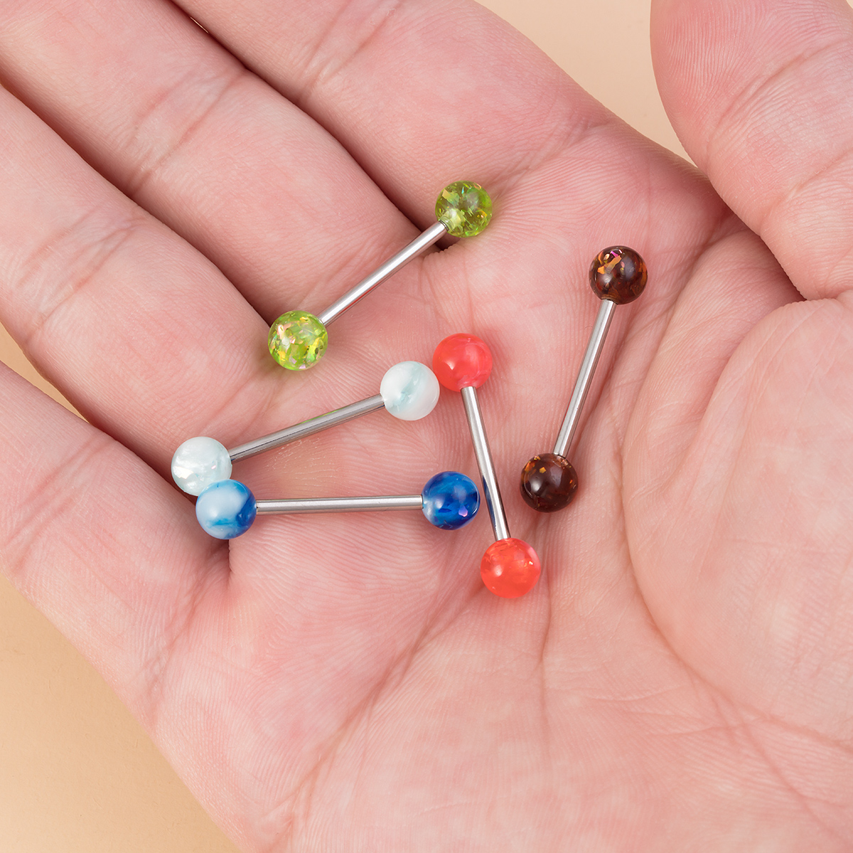 Wholesale of stainless steel acrylic tongue studs, glitter, milk ring studs, body piercing accessories