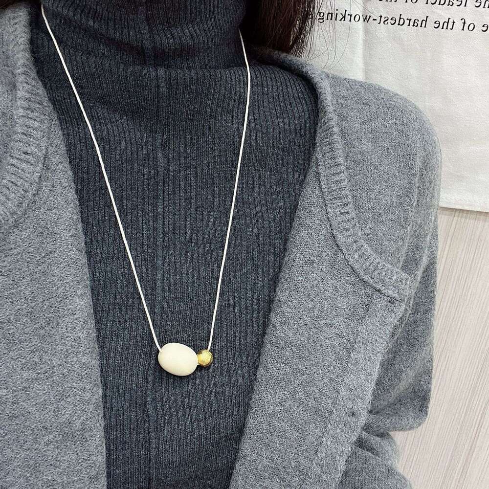 Niche Design Emotion Pendant for Women 24 New Style Tie Rope Long Sweater Chain Versatile Fashionable Simple Necklace 701