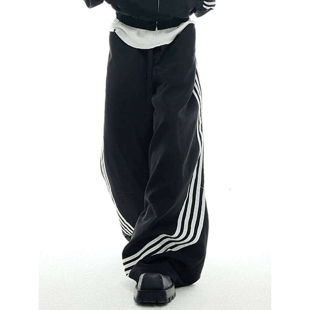 Mauroicardi Spring Cool Baggy White And Black Striped Wide Leg Pants For Mens Elastic Waist Designer Clothes Streetwear