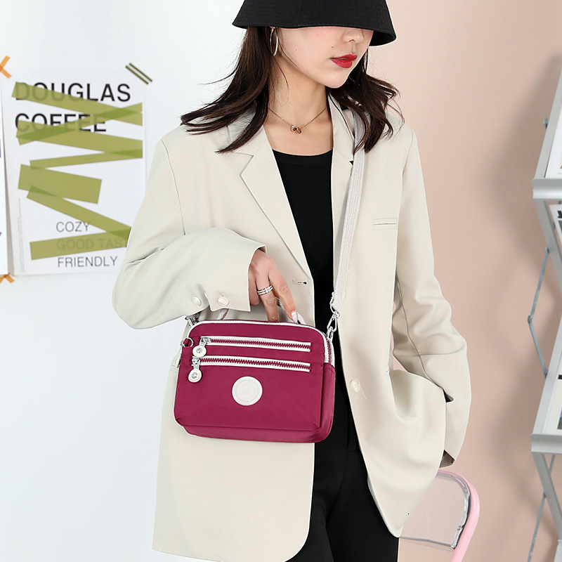 2025 New Women's Fashion Trend Shoulder Simple Color-Block Crossbody Bag Nylon Phone Coin Purse ddmymoon